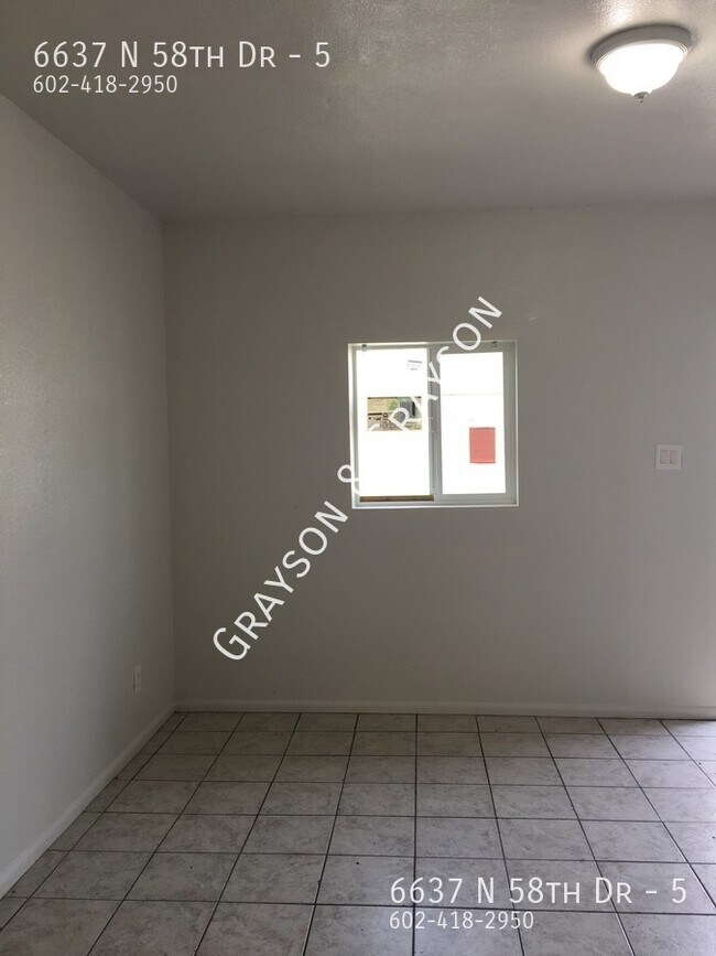 Building Photo - 6637 N 58th Dr
