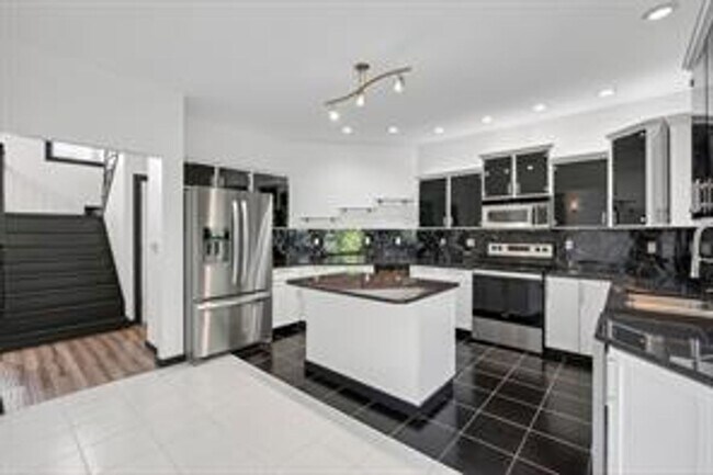 Building Photo - Spacious 5-Bed Walkout Home with Over 3,500 Sq. Ft. of Living Space