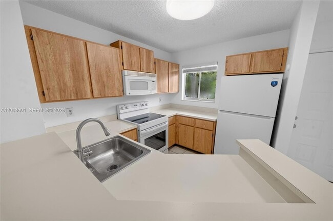 Building Photo - 8750 N Sherman Cir