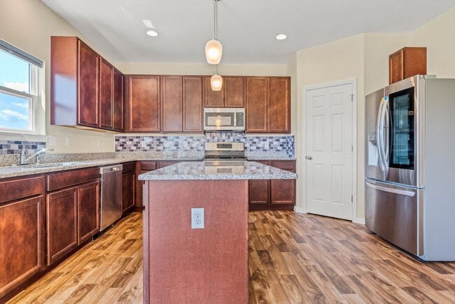 Building Photo - COMING SOON - Modern, Spacious Home in the Orchard Farm School District!