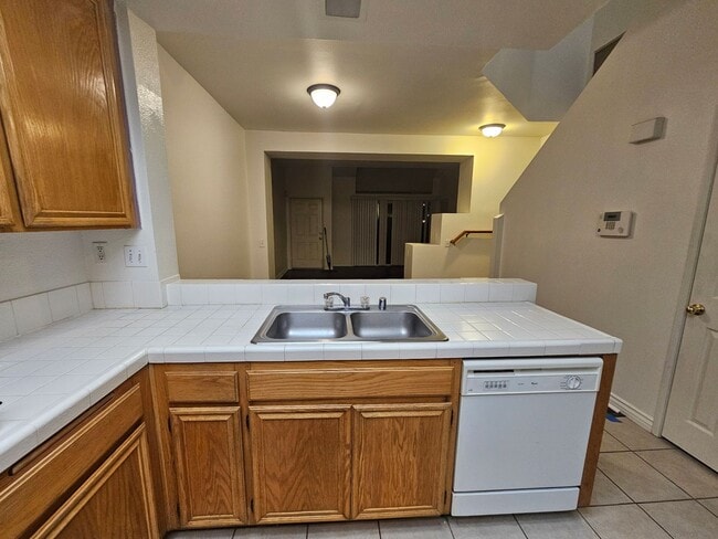 Building Photo - Gated Community~$2,595~ 2 Bed/2.5 Bath End Unit Townhome.