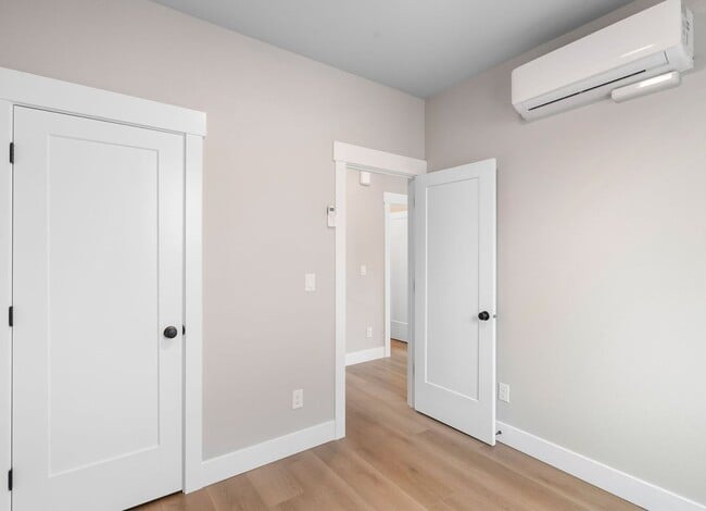Building Photo - Brand-New Detached 2 Bedroom Home with Private Fenced Yard and Designer Finishes