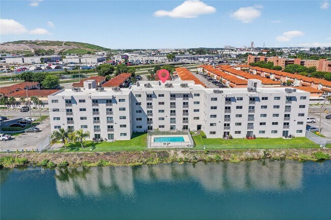 Building Photo - 9915 W Okeechobee Rd