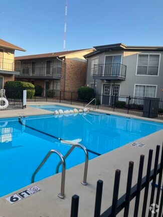 Building Photo - Santa Fe Village & Highlander Apartments