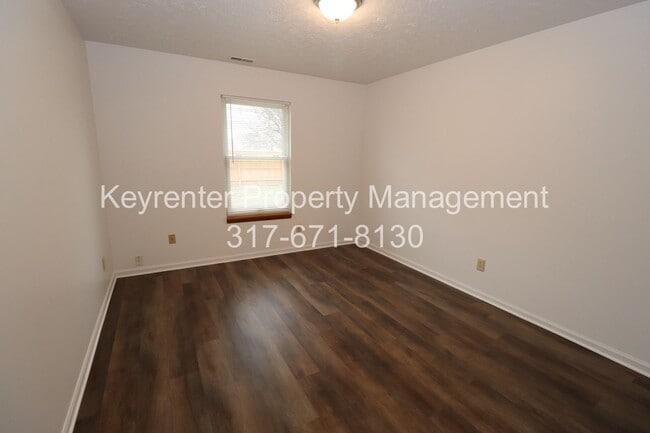 Building Photo - Discover this well-maintained 3-bedroom, 2-bath home in Indianapolis featuring an attached garage...
