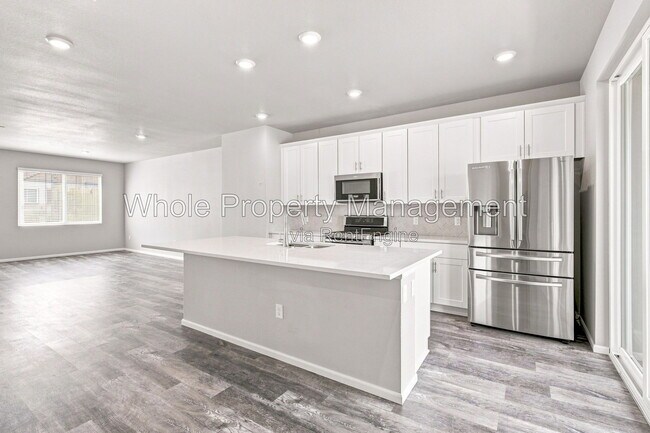 Building Photo - 12231 W 57th Dr