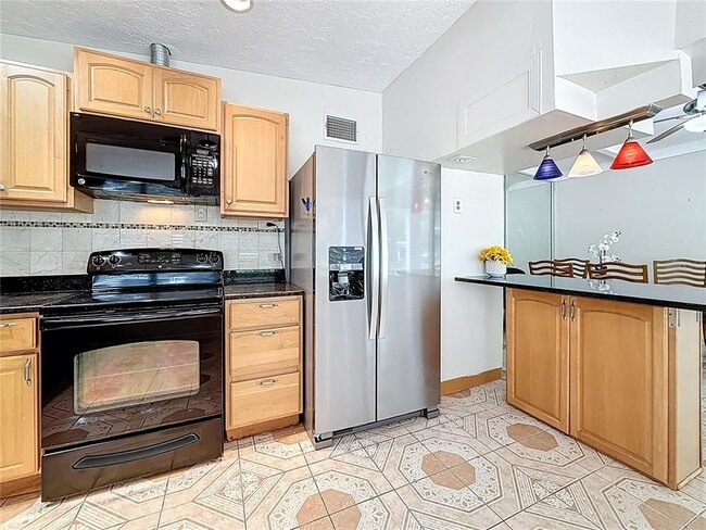 Building Photo - 6709 Orchard Dr N