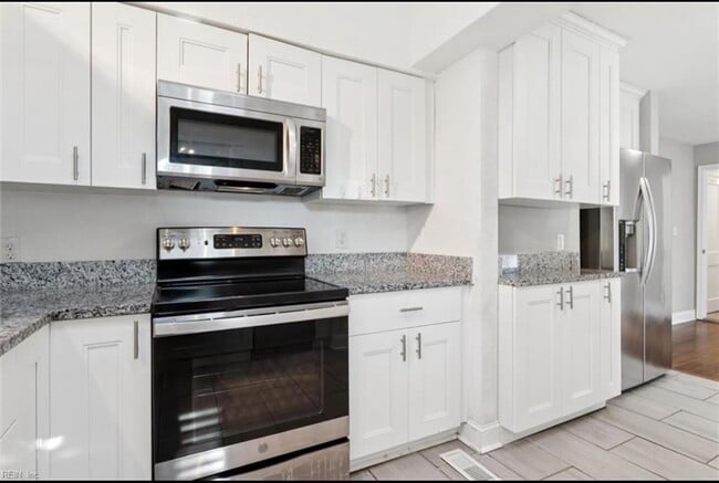 Building Photo - 7622 Newport Ave