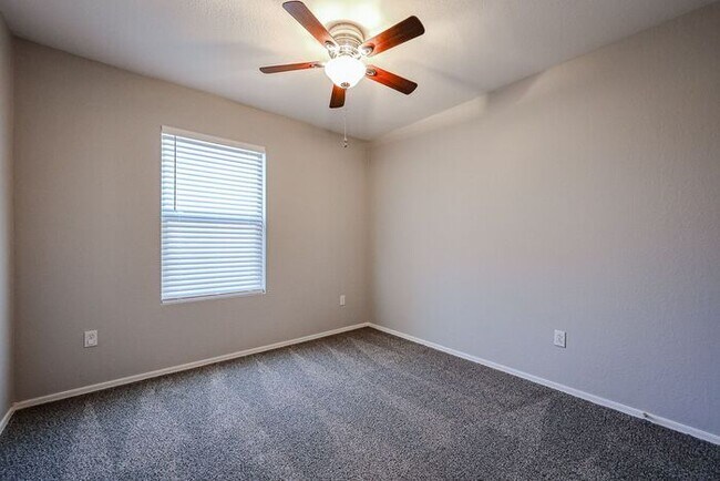 Building Photo - Introducing a stunning 4-bedroom, 2.5-bath...