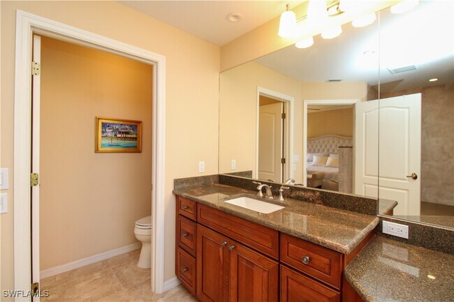 Building Photo - 7024 Pelican Bay Blvd