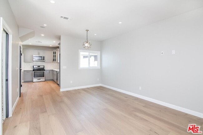 Building Photo - 1239 S Highland Ave