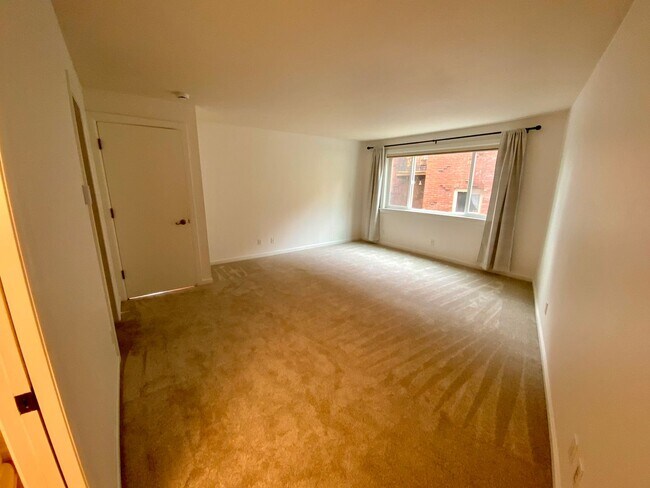 Building Photo - 1,300+ Sq Ft 2BR Condo w/ Parking, W/D & Utilities Included | $1,000 Move-In Credit