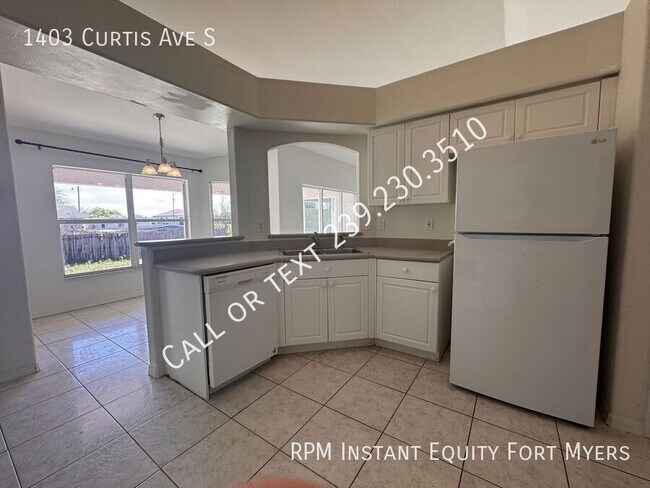 Building Photo - 1403 Curtis Ave S