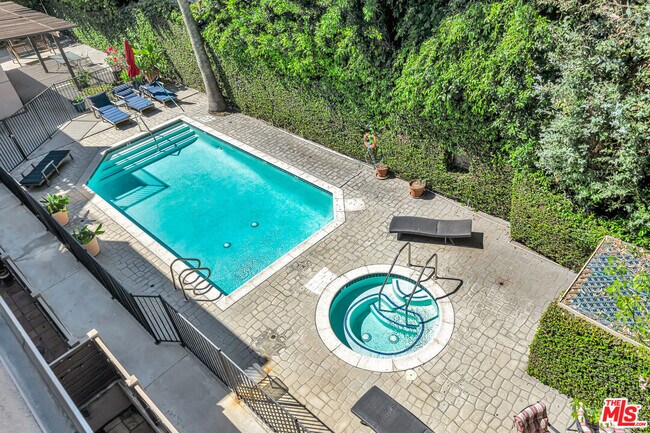 Building Photo - 4477 Woodman Ave