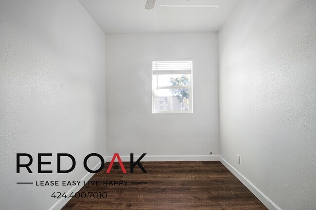 Building Photo - 1847 1/2 W Florence Ave