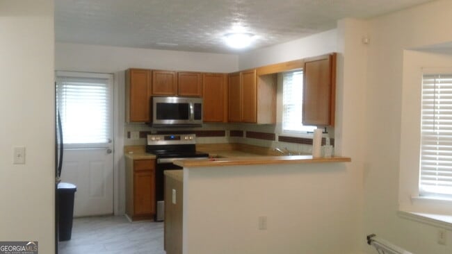 Building Photo - 6493 Wellington Chase Ct