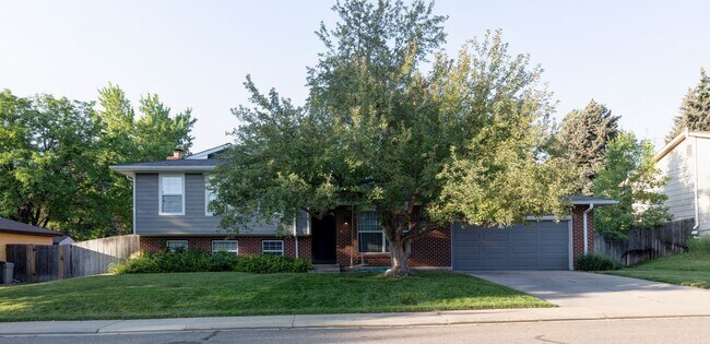 Building Photo - Spacious 4-Bedroom Home with Private Backyard and Solar Savings – Prime Location!