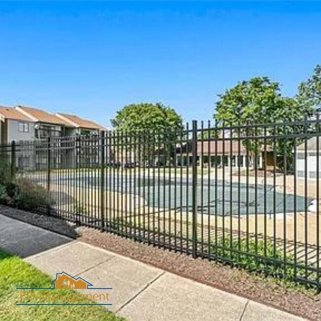 Building Photo - Modern First-Floor with Private Patio in Hampton Club