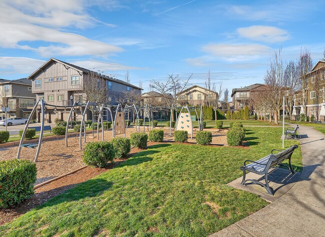 Building Photo - 2BR + 2.1BA Corner Townhome-Style Condo — Dual Primary Suites, Attached Garage & Most Utilities I...