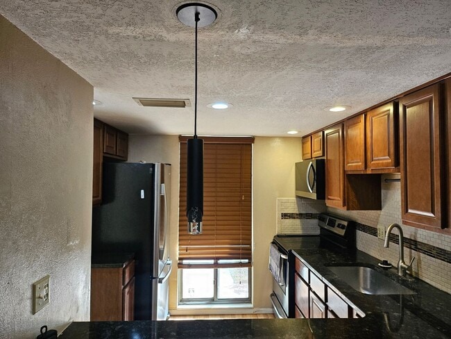 Building Photo - Winter Springs Gem: 2 BED 1.5 BATH Two-Story Condo with Amazing Amenities - (BAYTREE 4 CONDOS)