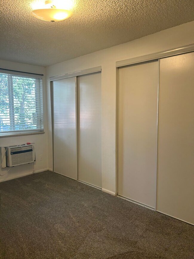 Building Photo - Wonderful 1 BR/1 BA Ground Floor Condo in ...