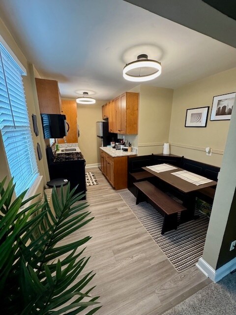 Fully equipped kitchen w/ breakfast nook area. - 3935 S St SE