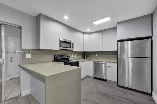 Building Photo - 5963 NW 25th Ct