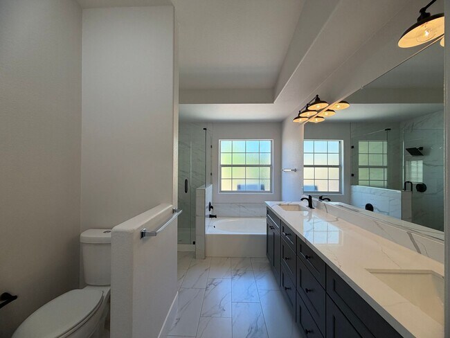 Building Photo - BEAUTIFULLY UPGRADED SINGLE FAMILY HOME - 3 BEDROOM, CORNER LOT WITH VAULTED CEILINGS