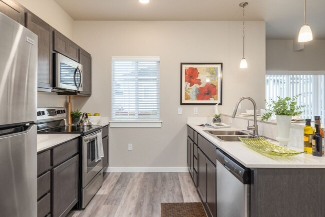 Building Photo - Wilson Creek Townhomes - $500 off with 6-months of free covered parking for move-ins by the end o...