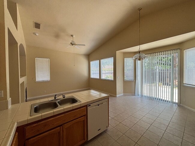Building Photo - Three Bedroom Two Bathroom Home - Refriger...