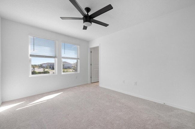 Building Photo - BEAUTIFUL 2 BEDROOM 2.5 BATHROOM TOWNHOME LOCATED IN THE HIGHLY SOUGHT AFTER SKY RANCH COMMUNITY!