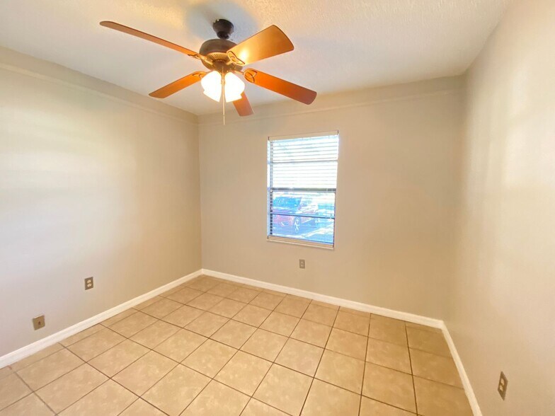 Building Photo - 2/2 home with garage - tile on inside with...