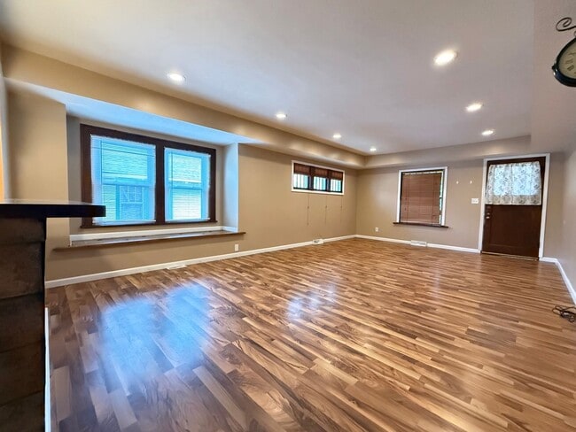 Building Photo - Bright West End Home with Enclosed Porch, Fenced Yard & Garage