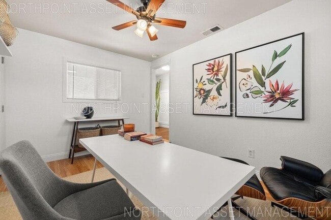 Building Photo - Welcome to this stunning 4-bedroom, 2-bath...