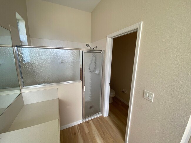 Building Photo - ANNUAL Lease – Unfurnished – Golf Course Lot - Designer Home in the highly sought-after gated com...