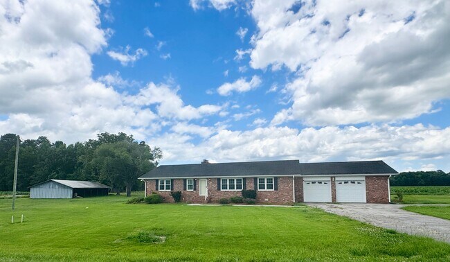 Building Photo - Hard-to-Find Home with Garage & Detached Shed & Modern Updates