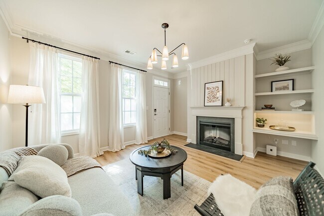 Building Photo - UPGRADES! Two Bedroom Townhouse - Six Mont...