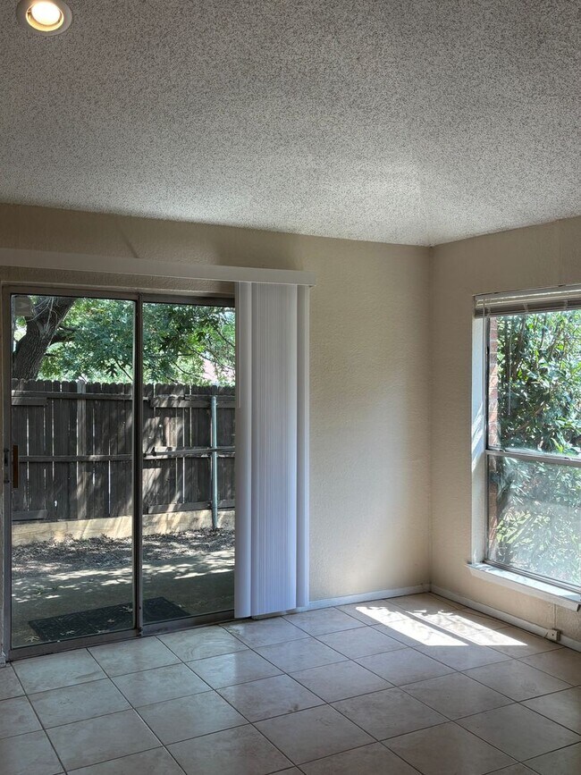 Building Photo - 7601-7603 Silveridge Dr