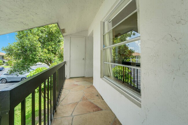 Building Photo - 5890 Sugar Palm Ct