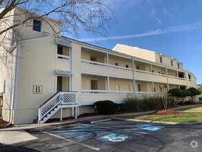 Building Photo - First Floor, 1 Bedroom, 1.5 Bath Condo Wit...