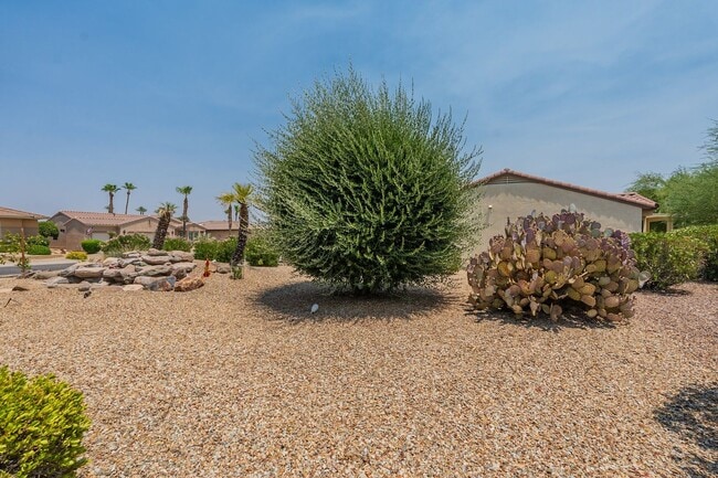 Building Photo - STUNNING Home with New AC in Exclusive 'Th...