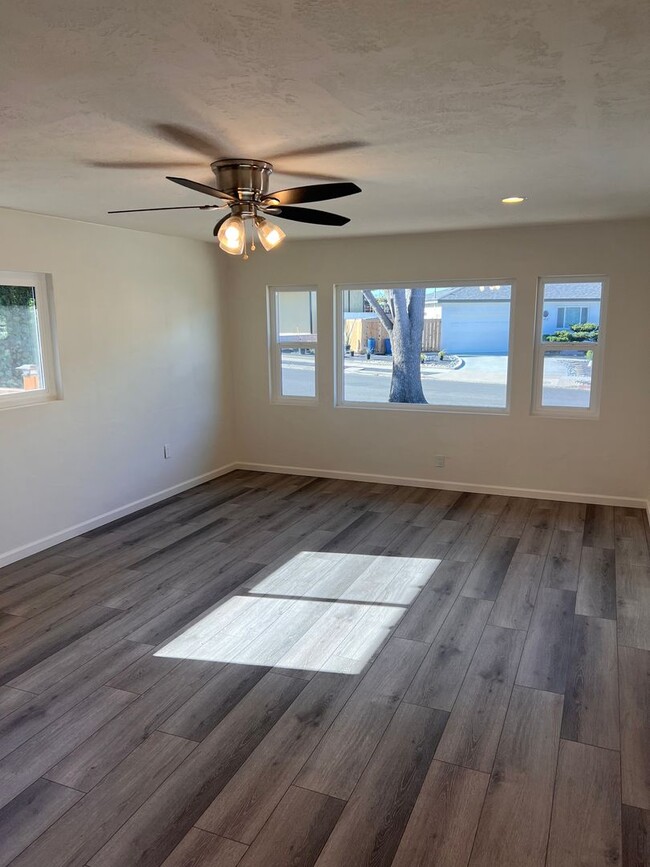 Building Photo - Freshly remodeled 4 bedroom, 2 bath single...