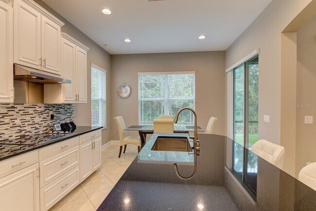 Building Photo - 4/3 Stylish and Spacious 2-story home with...