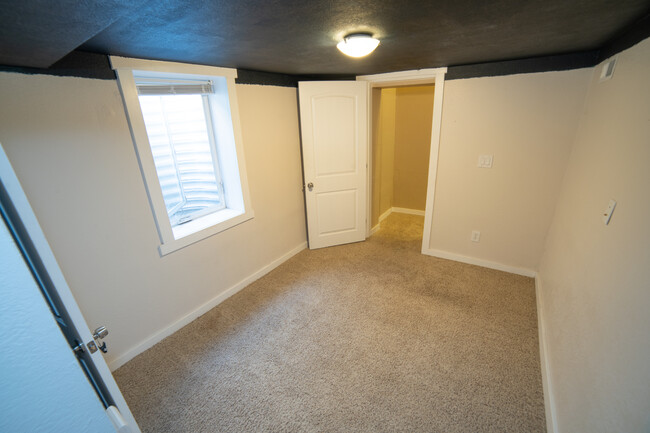 Basement with egress window - 5410 Monaco St