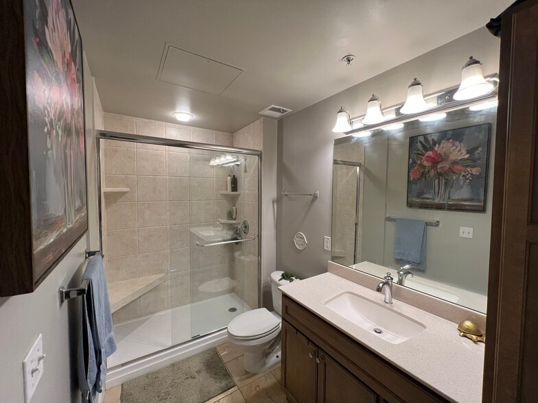 Master Bath (newly redone with walk-in shower and wide sink vanity - lots of storage to the right) - 1950 N Logan St