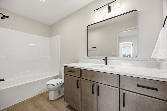 Building Photo - Big Ben at the Loop – Brand New 3 Bedroom Condo | Attached 2-Stall Garage