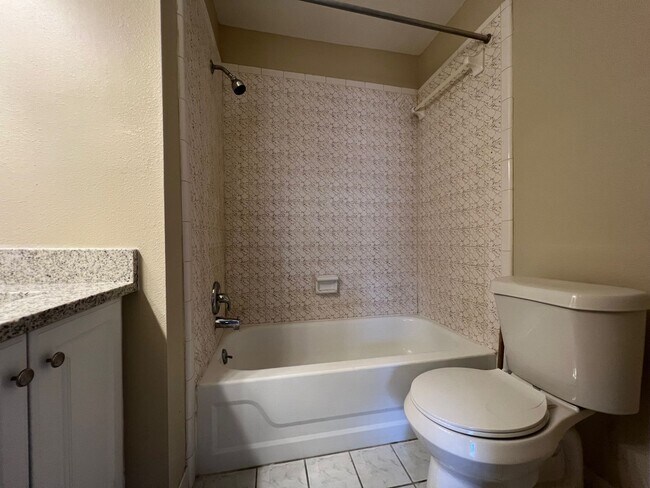 Building Photo - Newly Renovated 3/2 Home ~ Brand New Kitchen ~ Updated Bathrooms ~ Fenced Yard!