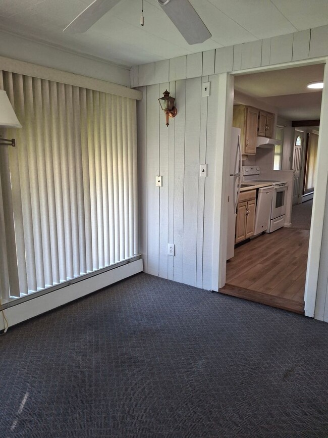 Building Photo - Charming 3-Bedroom Home with Backyard & Of...
