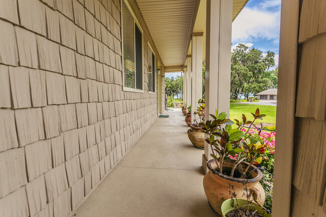 front porch facing the street or sit on the porch facing the lake - 12451 Insim Ln