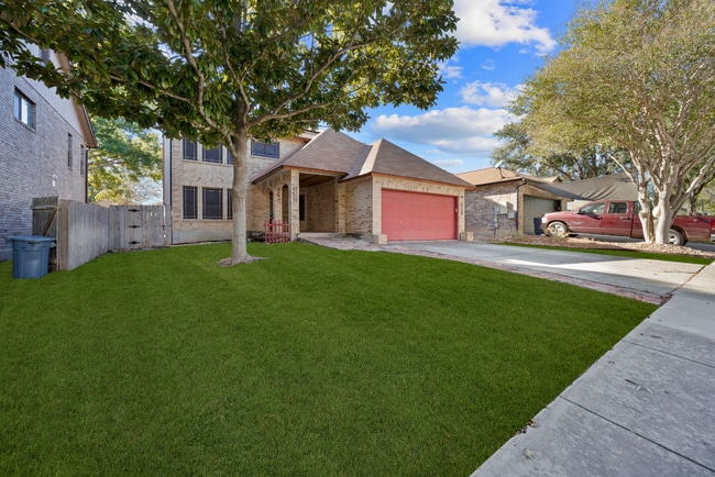 Building Photo - Sign your lease and receive a FREE 50" TV!!!  "Spacious 4-Bedroom Retreat with Fireplace in Charm...